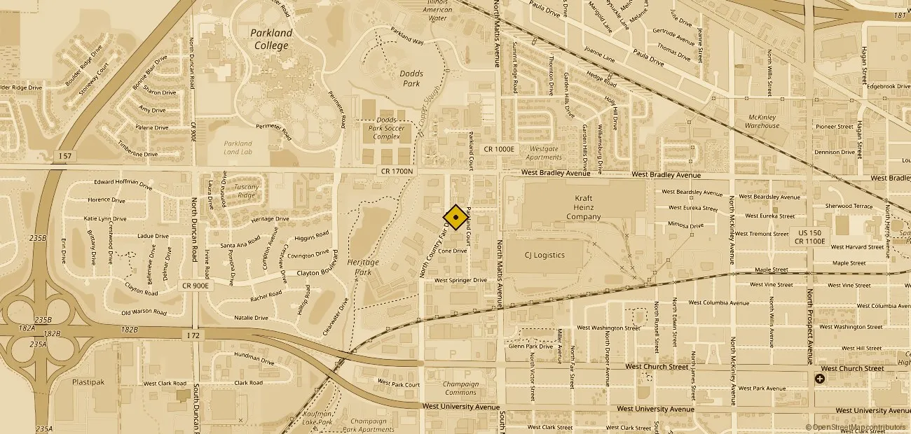 Map of Champaign showing the salon at 902 N Country Fair Dr, marked with a gold diamond